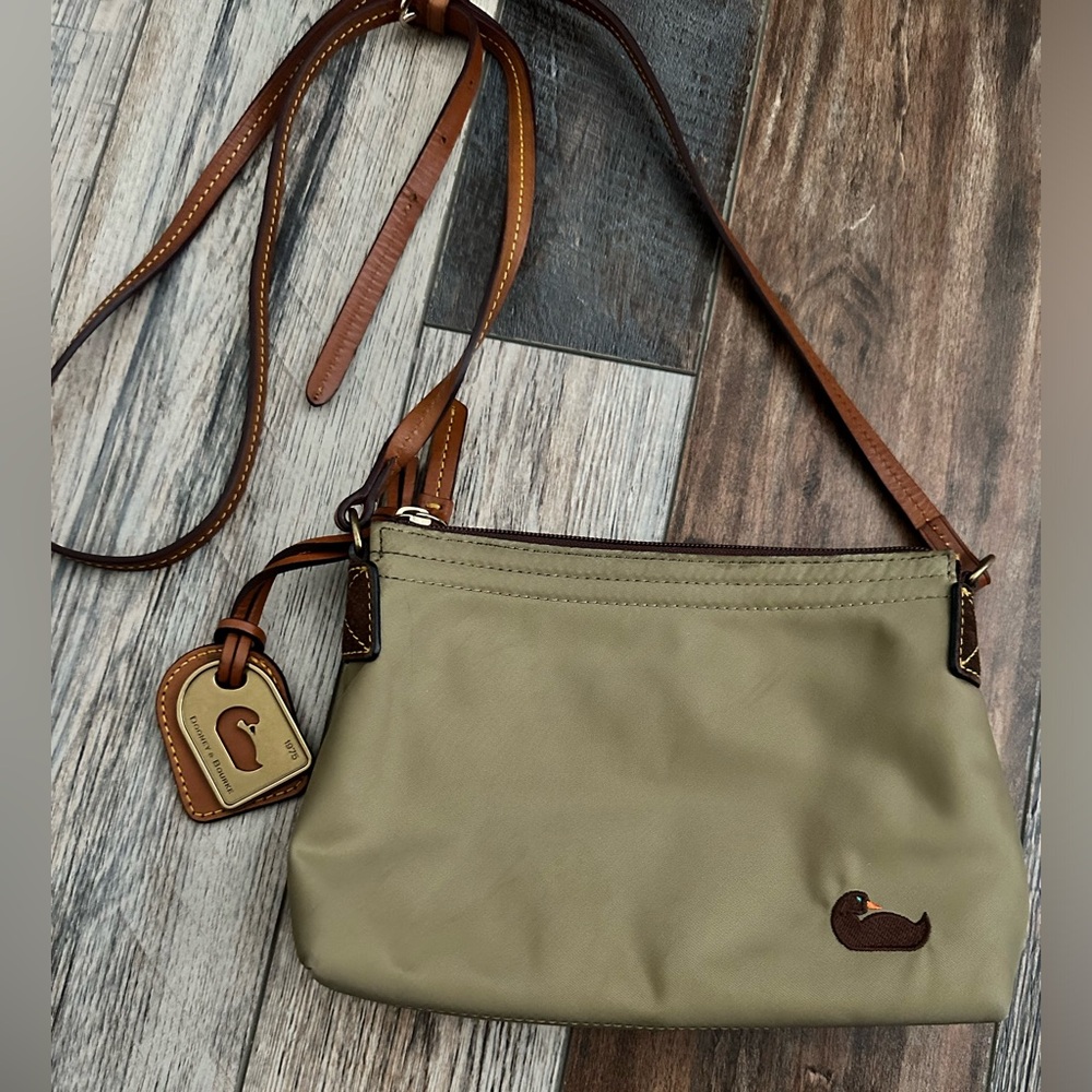 Dooney and Bourke purse says 1975